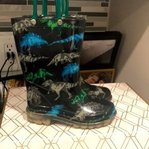 These are black dinosaur rain boots